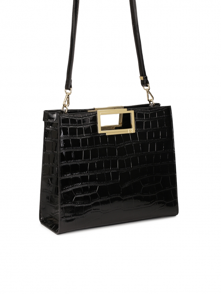 Czarna skórzana torebka z wbudowaną rączką