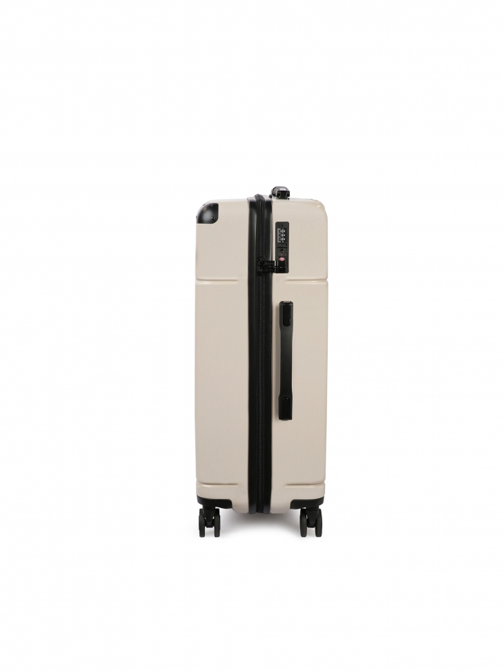 Średnia walizka z beżowego policarbonu