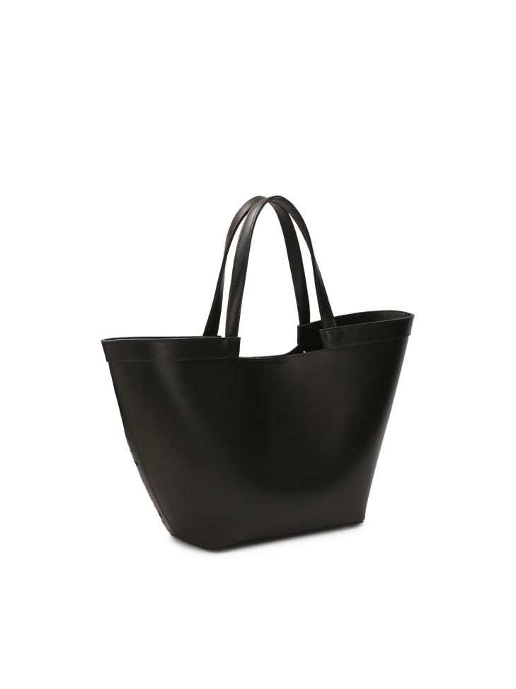 Skórzana torebka łódka w ażurowy wzór