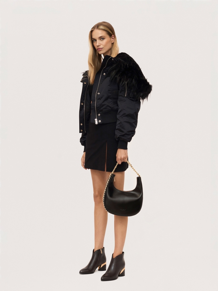 Ciemnobrązowe botki z wycięciem w cholewce i metalowym obcasem