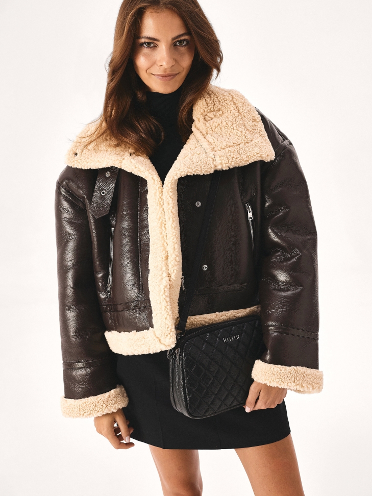 Pikowana skórzana torebka z trzema komorami