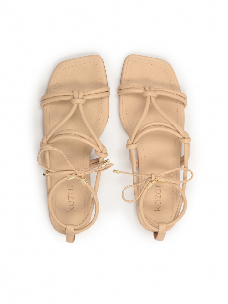 Wiązane płaskie sandały ze skóry