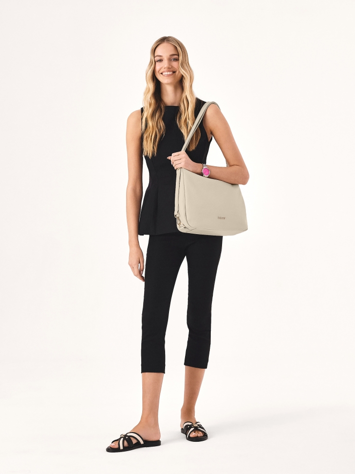 Kremowa listonoszka na zamek