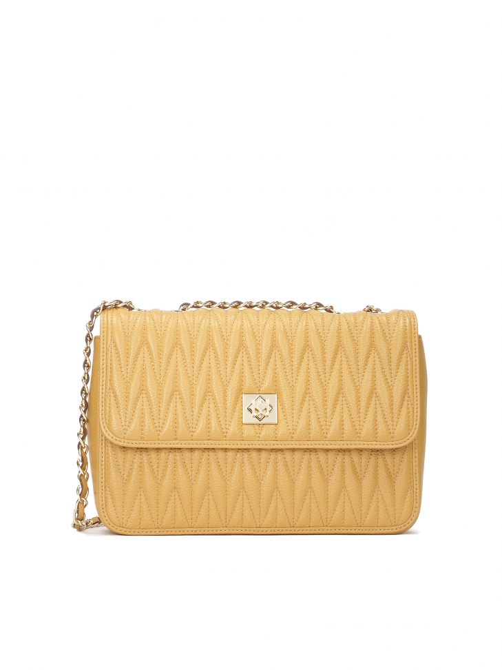 Skórzana torebka na łańcuszku w efektowny wzór