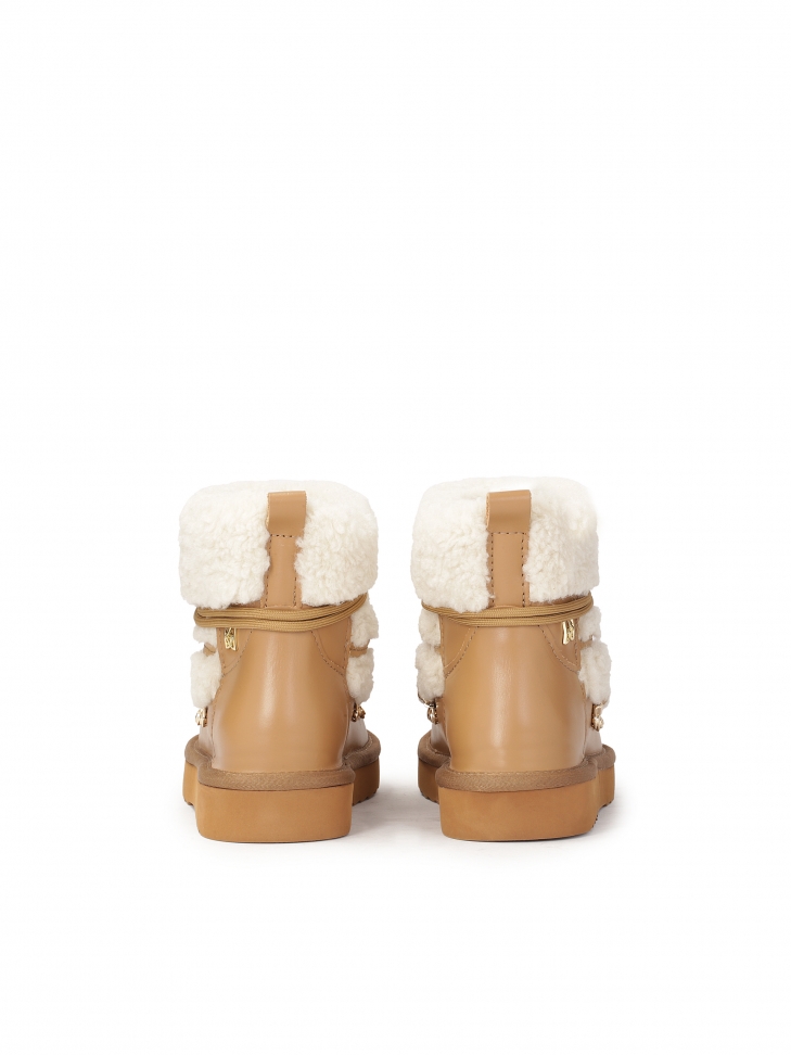 Brązowe śniegowce z futrem