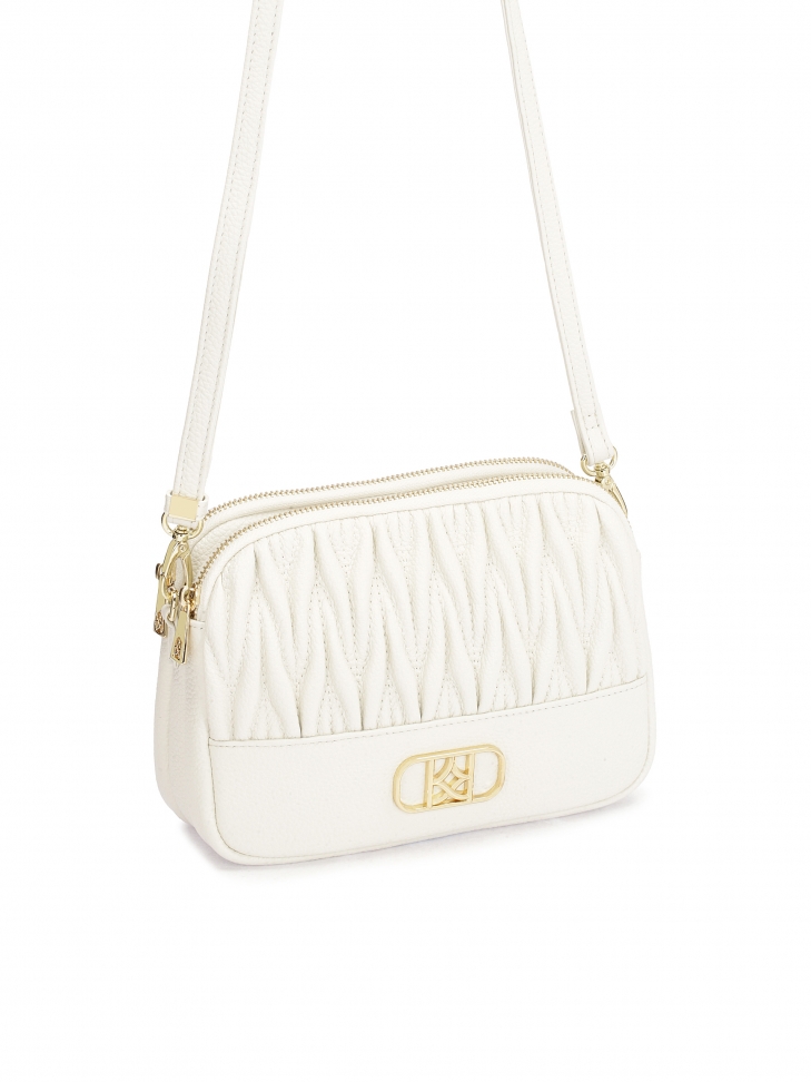 Skórzana mała torebka z pojemnym wnętrzem