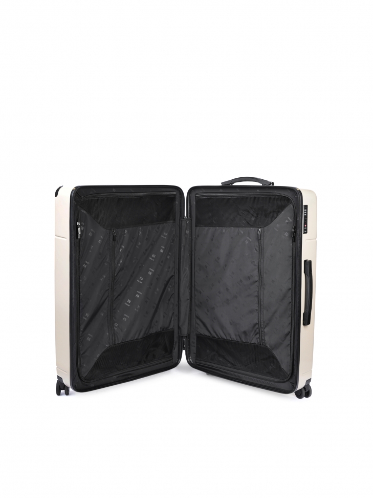 Duża beżowa walizka PC na zwrotnych kółkach