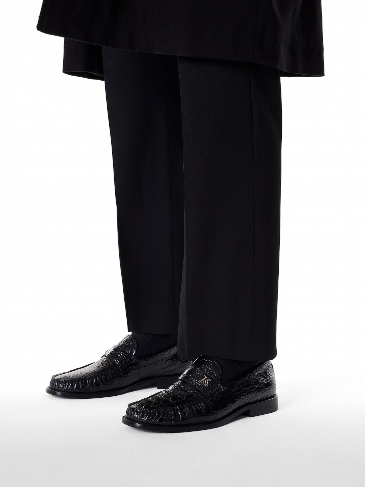 Czarne loafersy z tłoczonej skóry oko