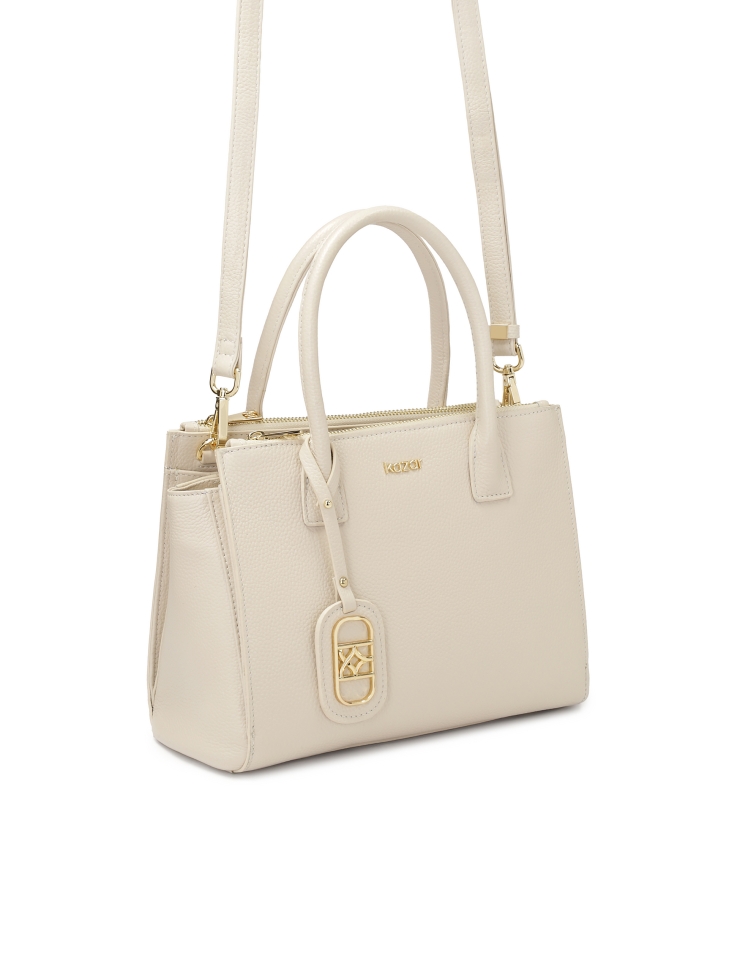 Elegancka skórzana torebka z rączkami