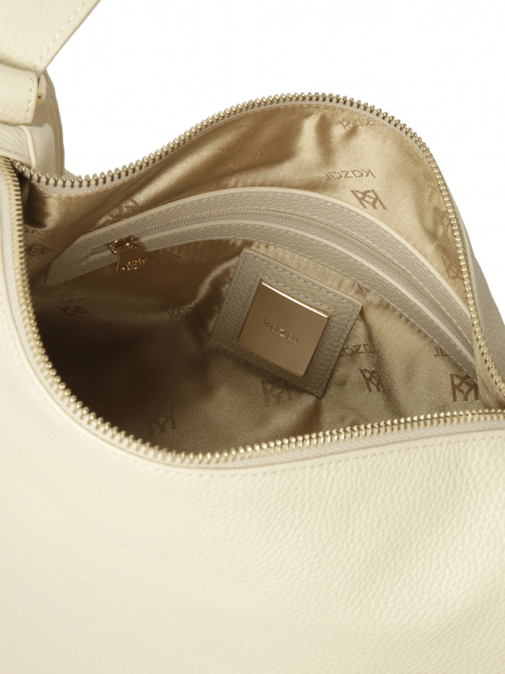 Kremowa listonoszka na zamek