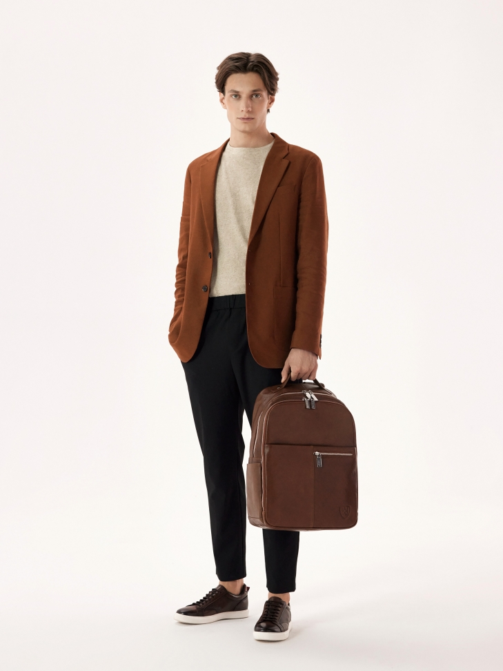 Brązowe skórzane sneakersy na białej podeszwie