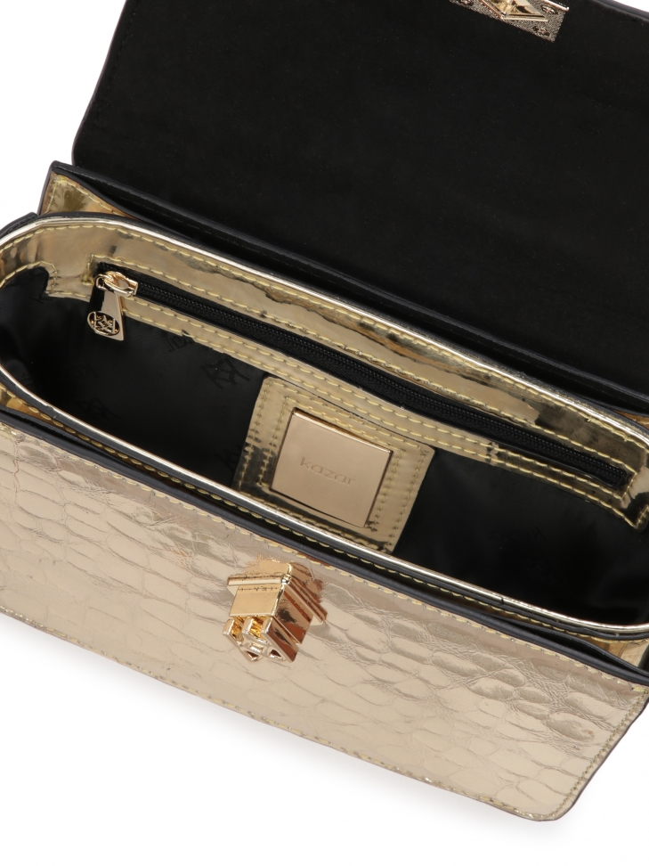 Mała usztywniana torebka do ręki i na ramię w otym kolorze