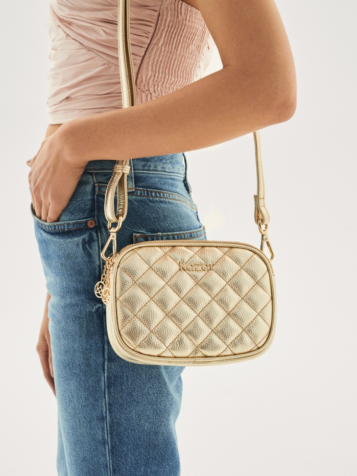 Złota torebka damska