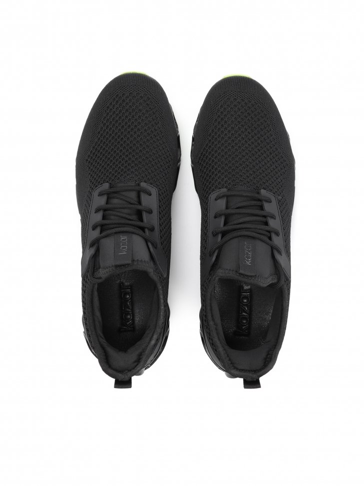 Oryginalne czarne sneakersy męskie z zieloną podeszwą