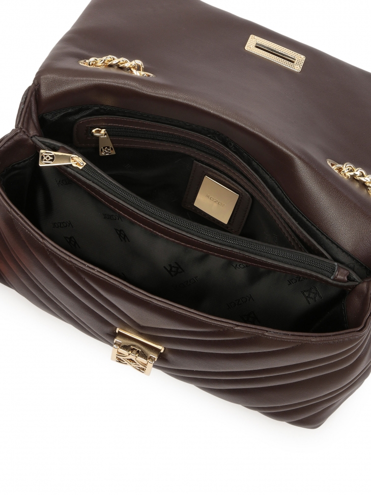 Kompaktowa torebka na ramię z modnym pikowaniem