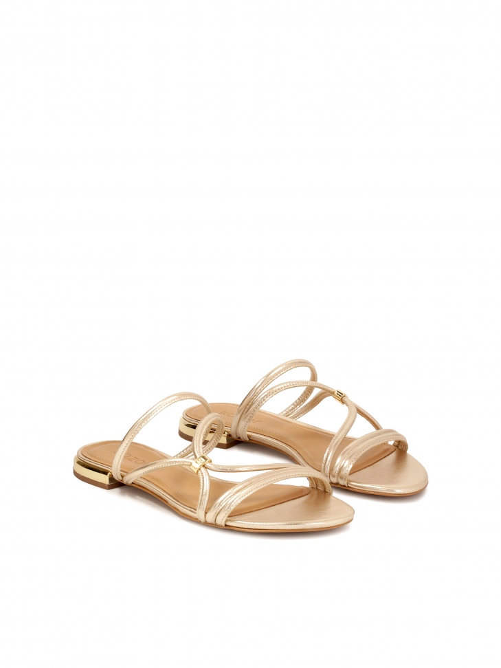 Złote klapki z możliwością noszenia jako sandały