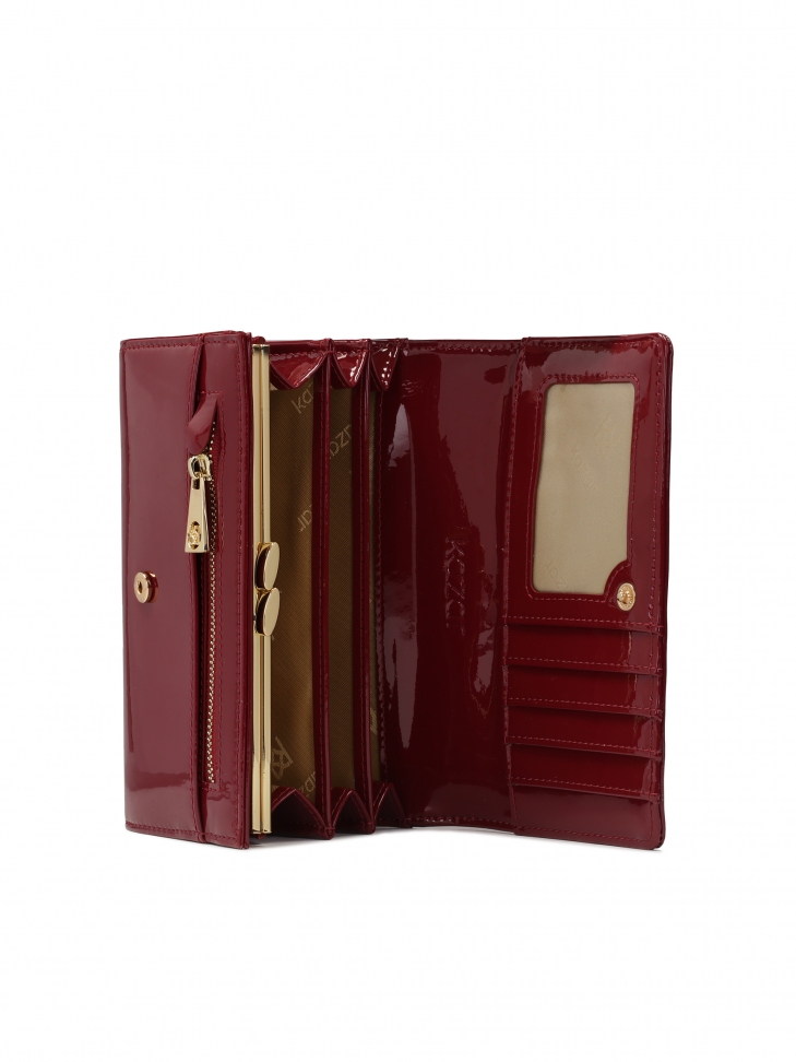 Elegancki lakierowany portfel z dużą ozdobą na przodzie