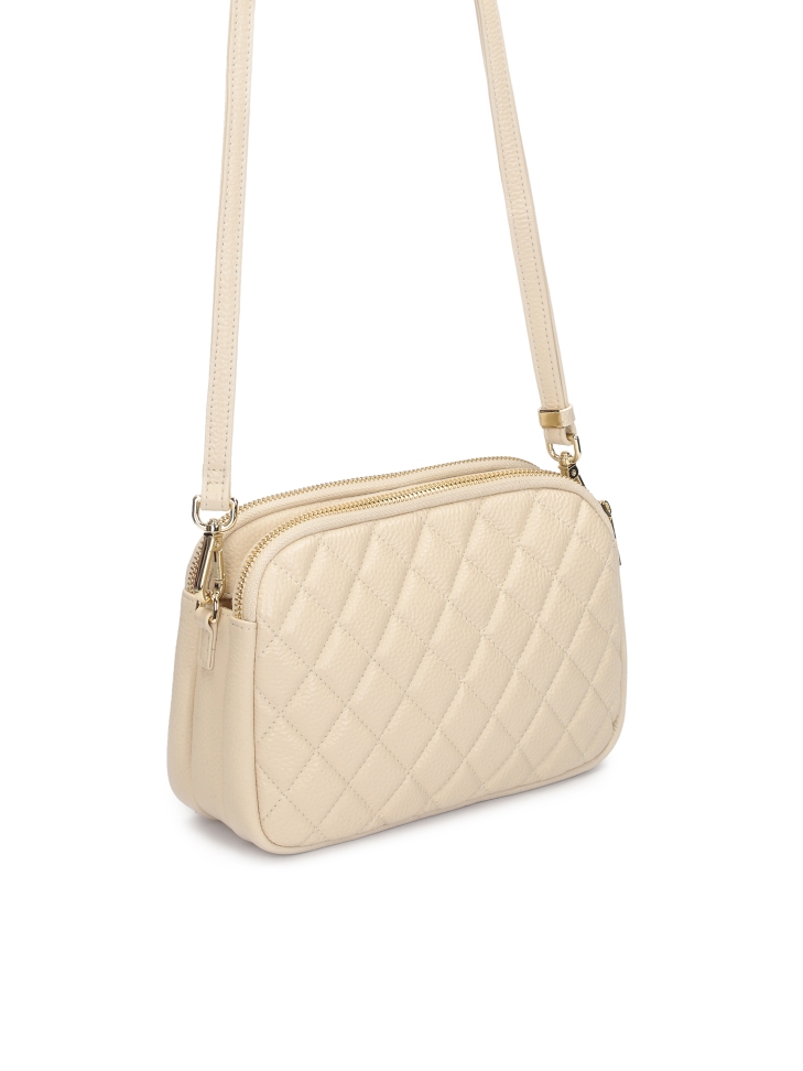 Skórzana torebka na pasku zdobiona pikowaniem