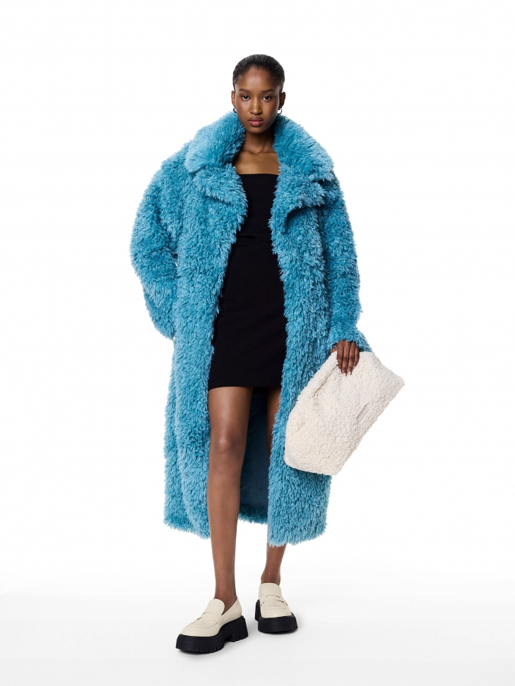 Futrzana kopertówka w jasnym kolorze