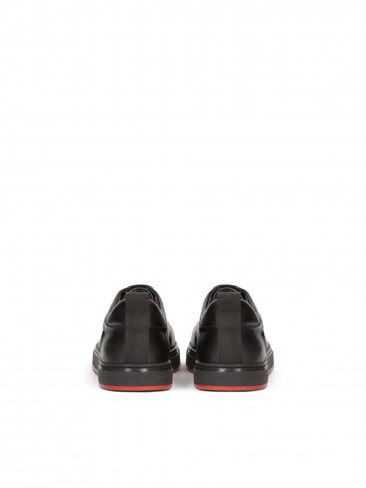 Skórzane czarne sneakersy z perforacją i czerwoną wstawką