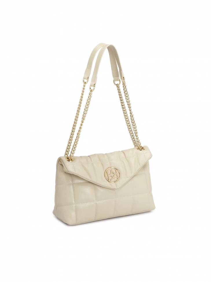 Skórzana torebka na łańcuchu zdobiona pikowaniem