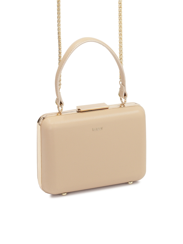 Sztywna torebka puzderko poyta skórą