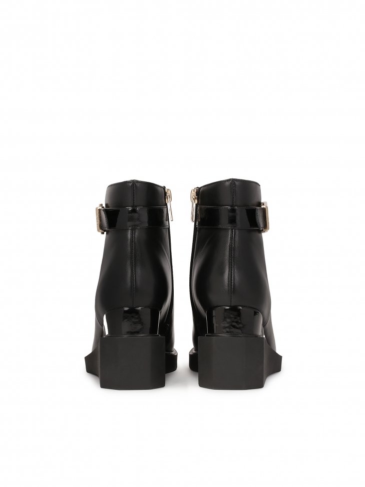 Skórzane botki na dwupoziomowym koturnie