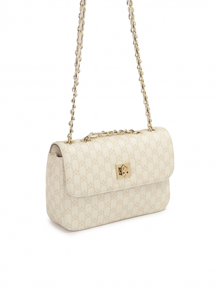 Zgrabna torebka ze skóry w beżowy print