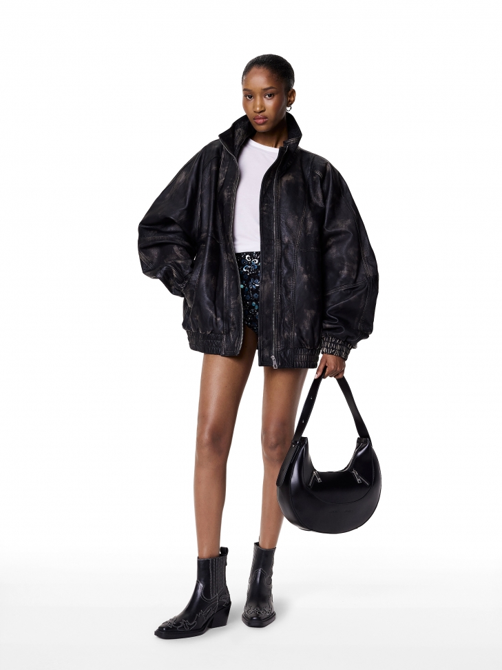 Skórzane kowbojki z wycinanym wzorem