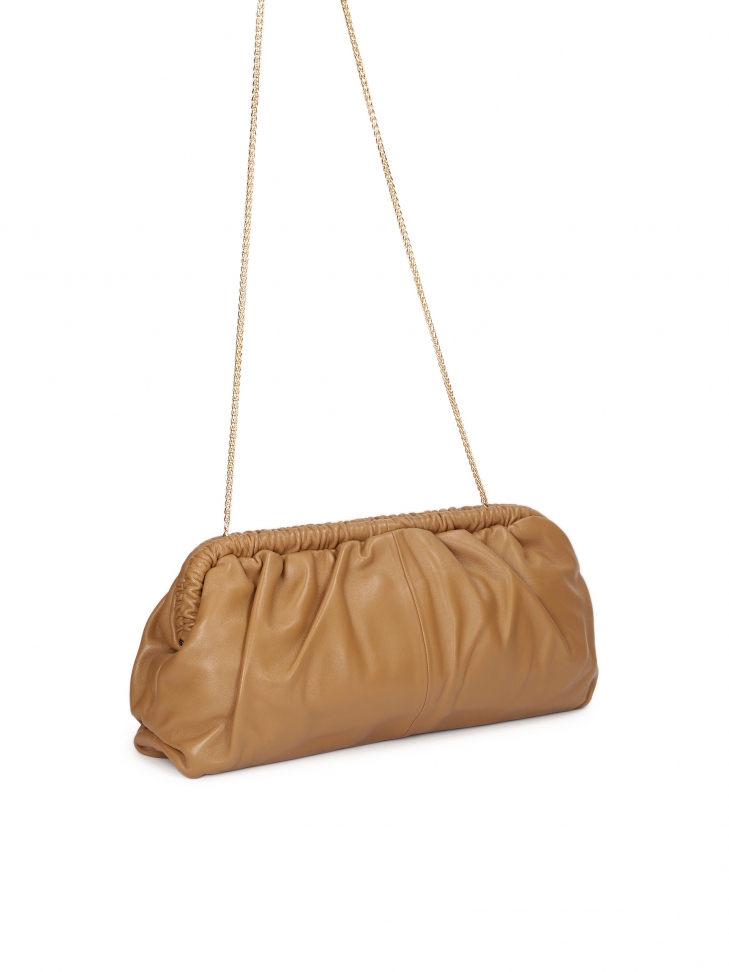 Skórzana torebka z metalową ramą