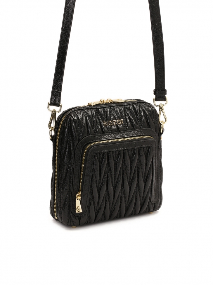 Skórzana czarna torebka z długim paskiem