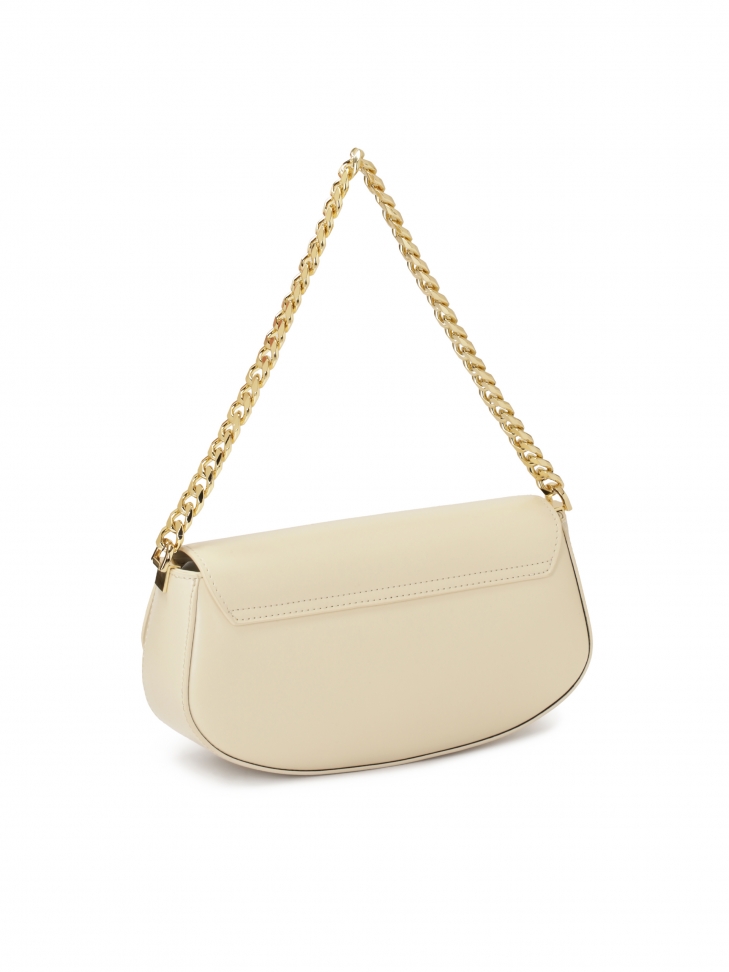 Kremowa torebka o sztywnej konstrukcji