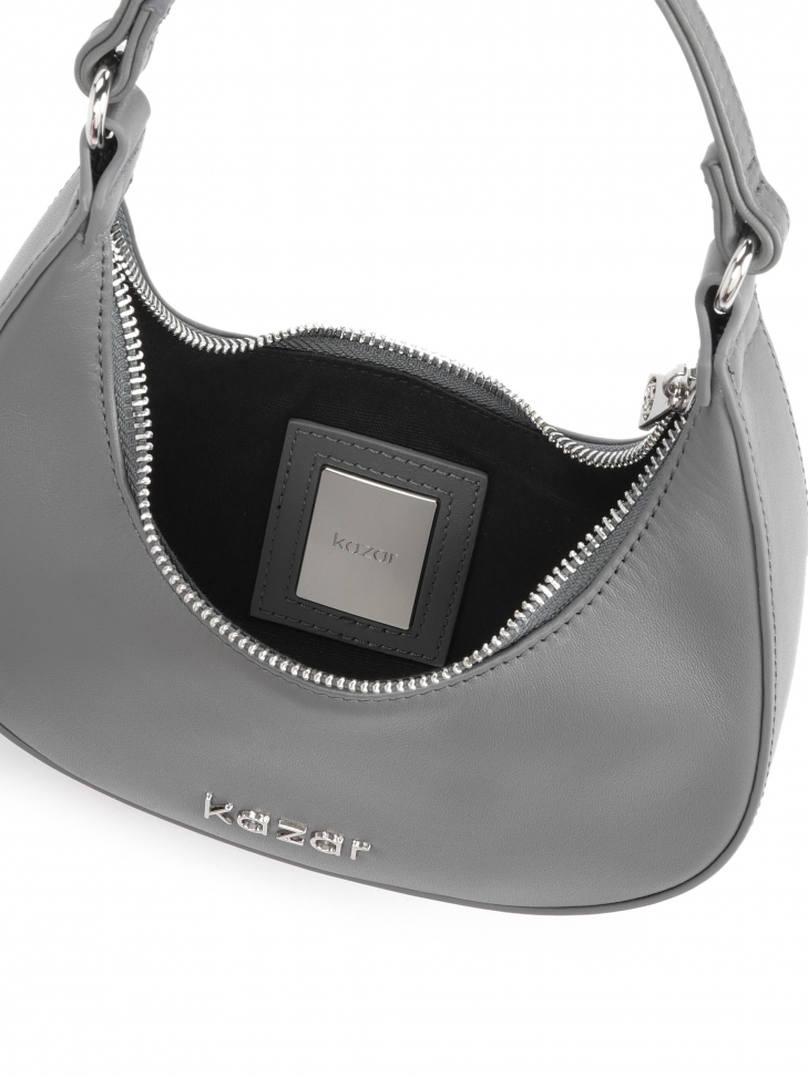 Zgrabna skórzana torebka półksiężyc do ręki i na ramię