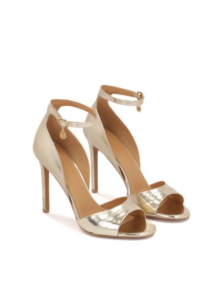 Złote sandały z zabudowaną piętą