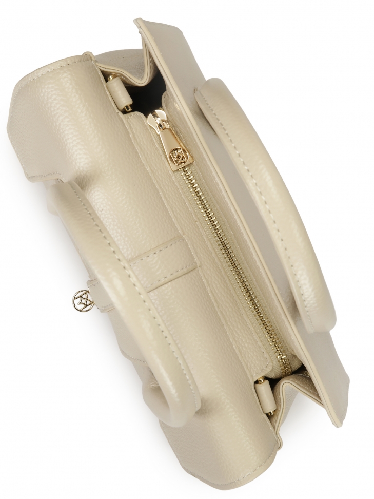 Szykowna skórzana torebka z finezyjną klapą