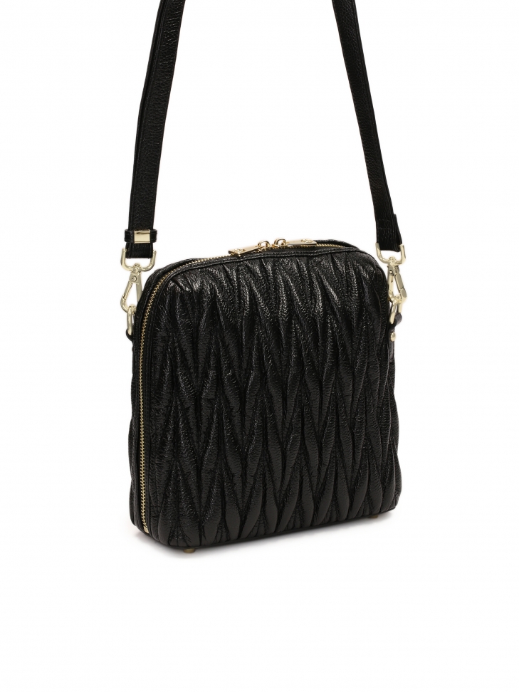 Skórzana czarna torebka z długim paskiem