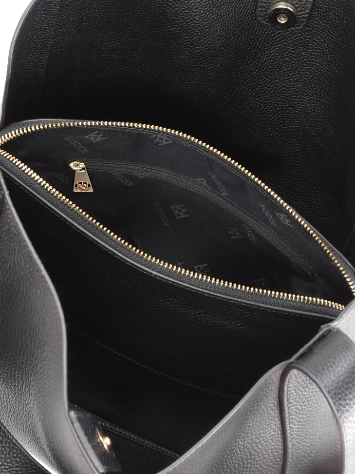 Skórzana torebka damska o unikatowym kształcie