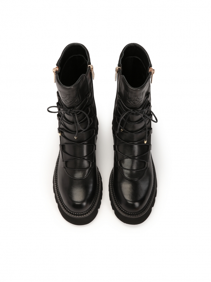 Wysokie skórzane trzewiki zdobione suwakami