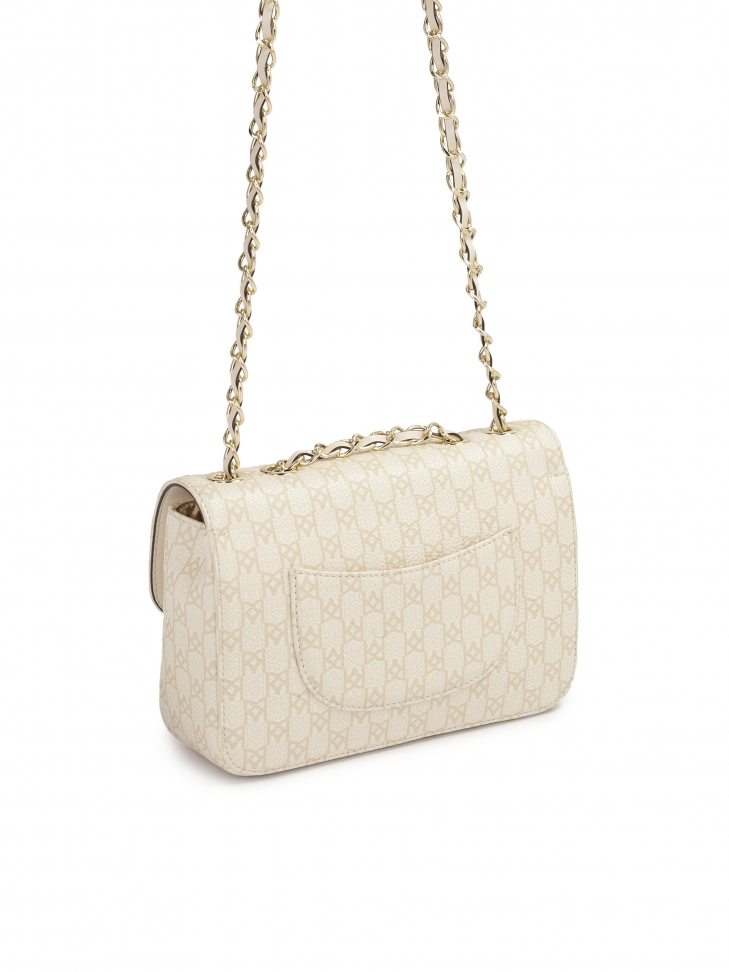 Zgrabna torebka ze skóry w beżowy print