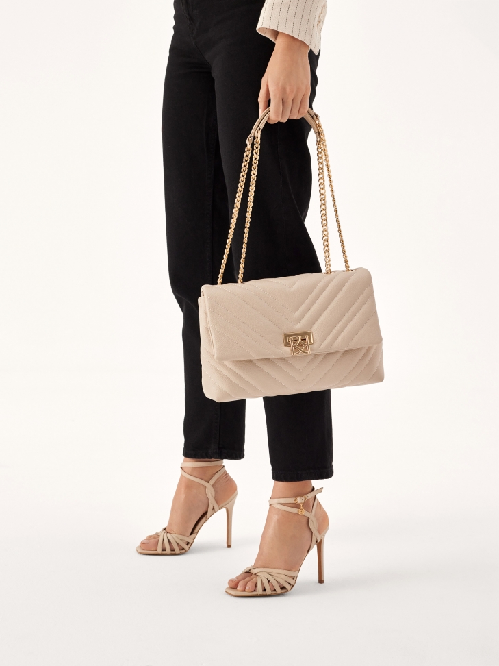 Pikowana torebka z klapą