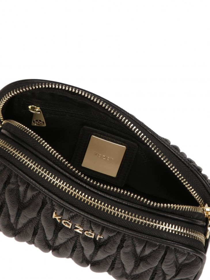 Pikowana mała torebka z regulowanym paskiem