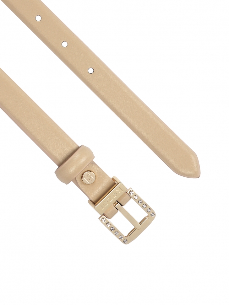 Gładki beżowy pasek zdobiony klamrą z yształkami