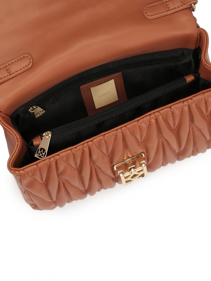 Brązowa torebka z finezyjnie pikowanej skóry