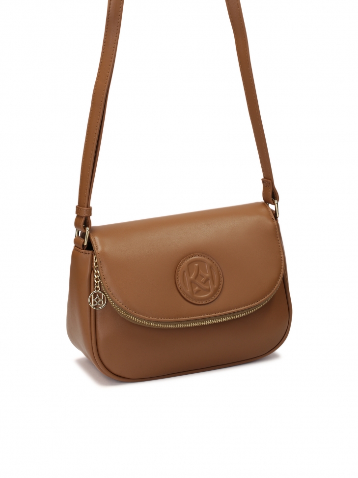 Brązowa skórzana torebka z kieszenią w klapie