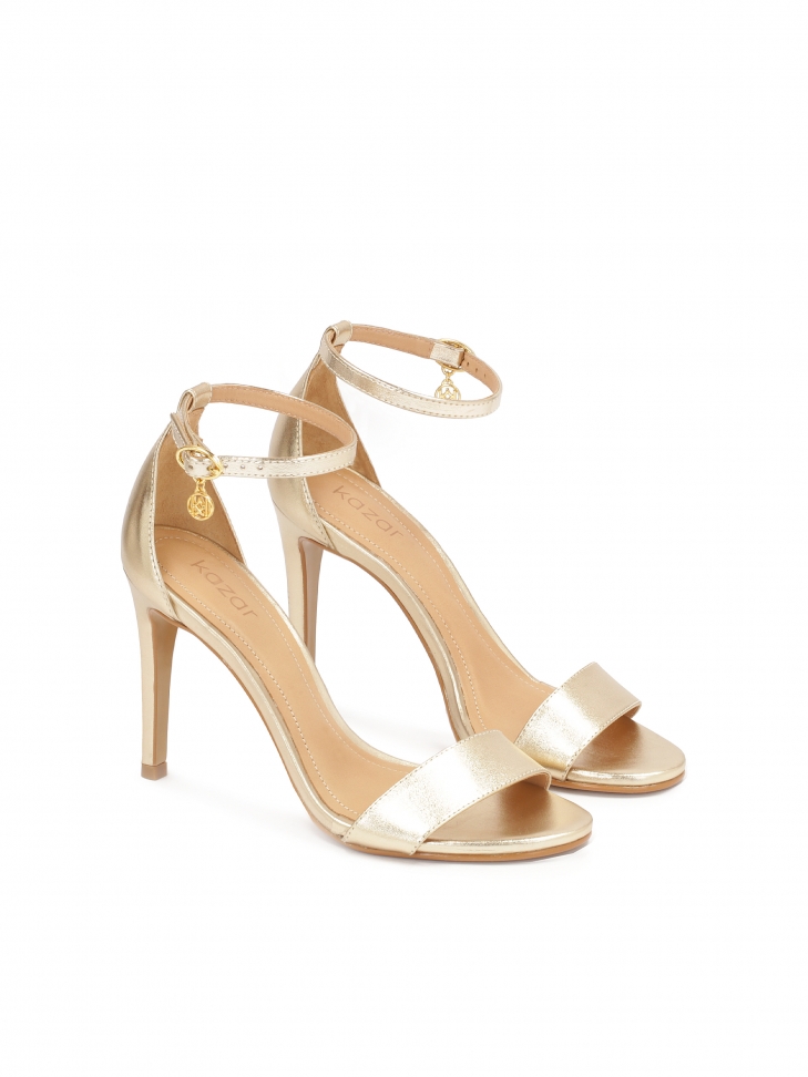 Złote sandały z zabudowaną piętą