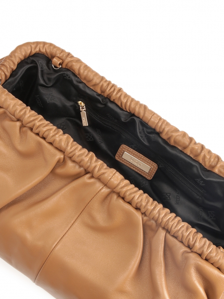 Skórzana torebka z metalową ramą