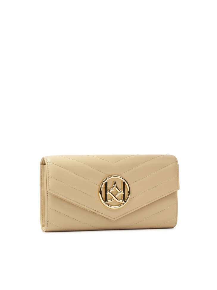 Beżowy podłużny portfel zdobiony przeszyciami