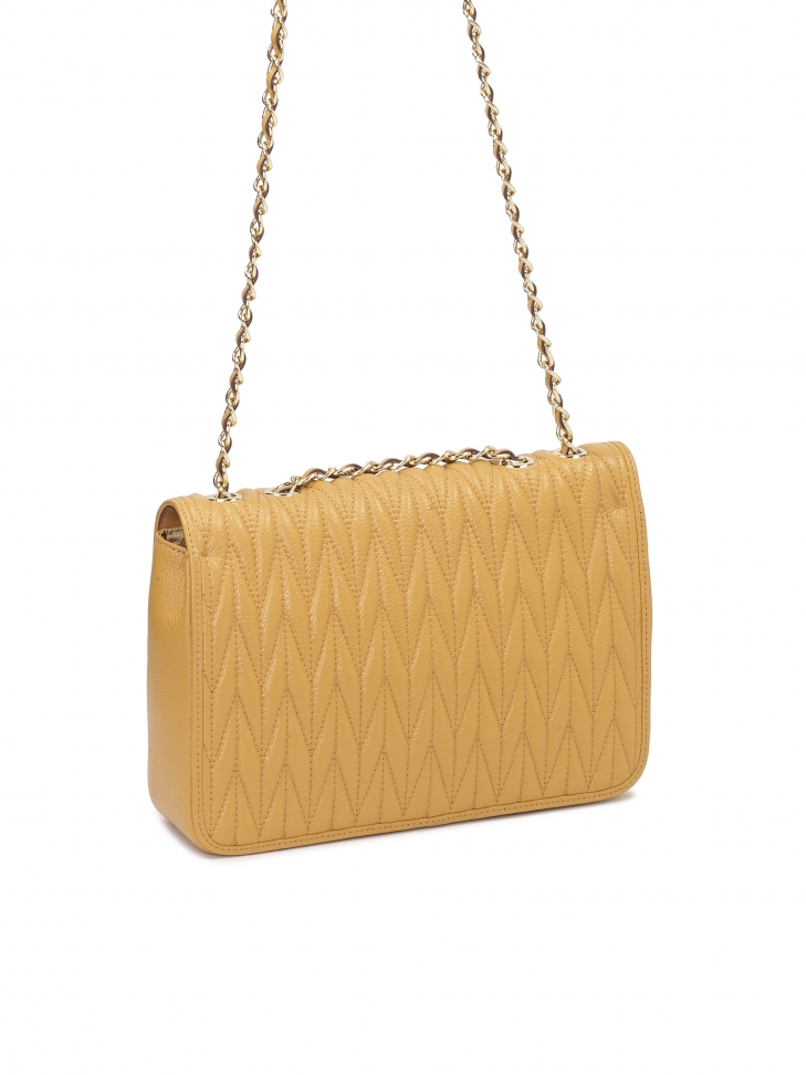 Skórzana torebka na łańcuszku w efektowny wzór