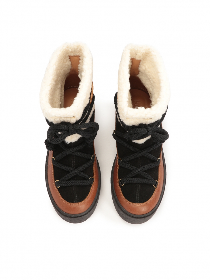 Kolorowe śniegowce z łączonych materiałów