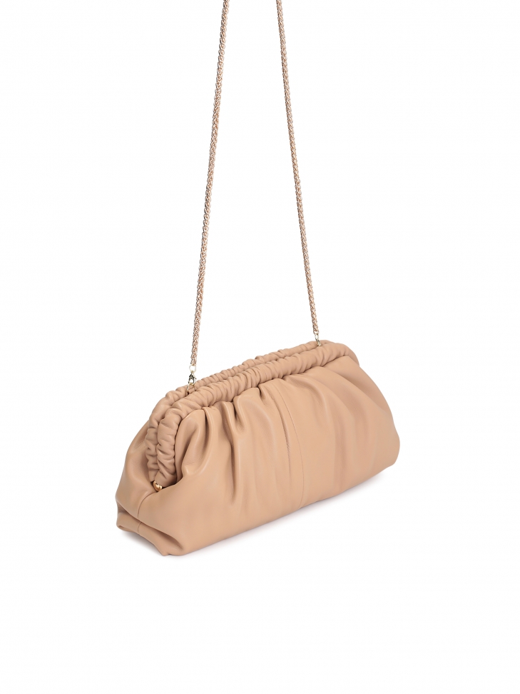 Efektowna skórzana torebka z metalową ramą